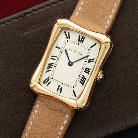 cartier bamboo coussin watch.